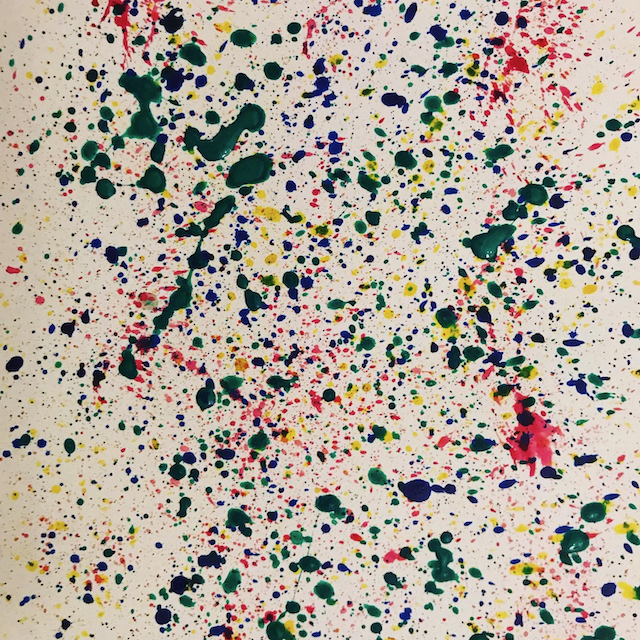 Spatters of paint in green, yellow and red